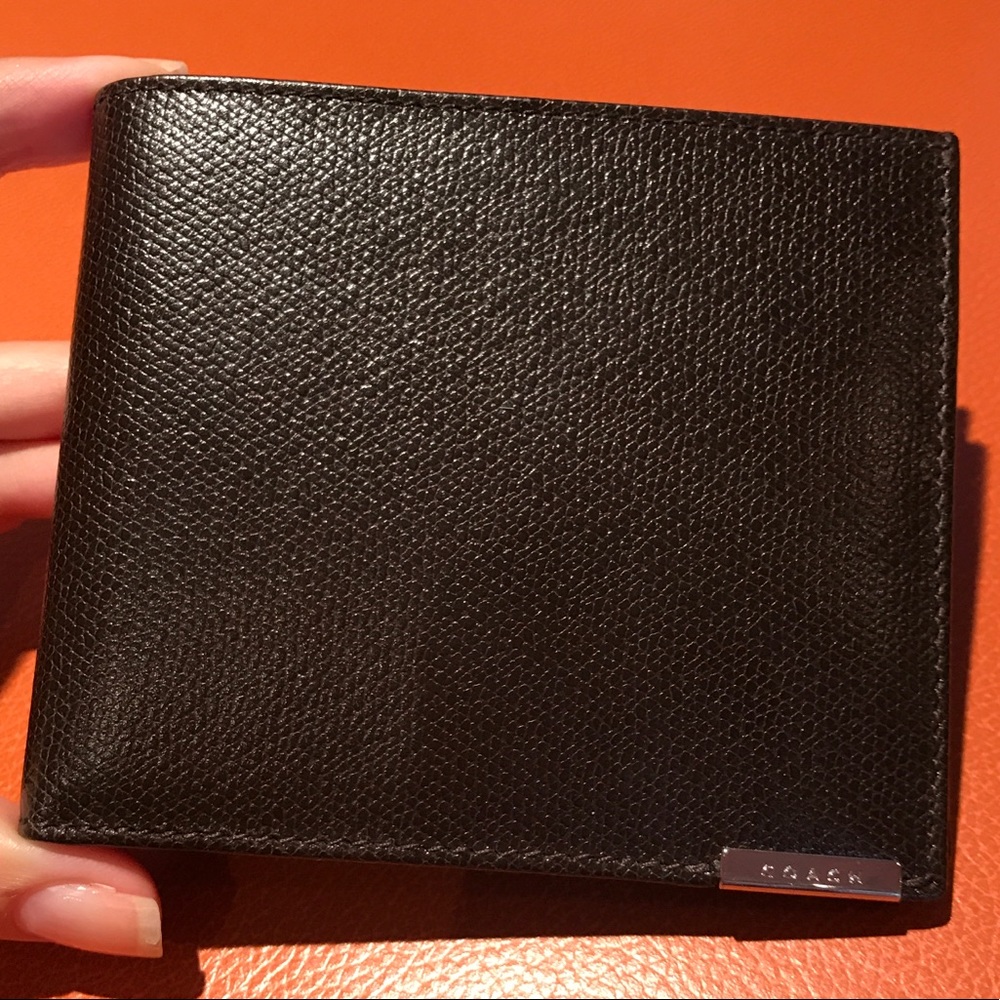 New never used genuine Coach black leather wallet